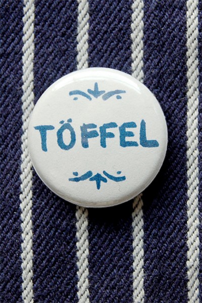 Button, Töffel