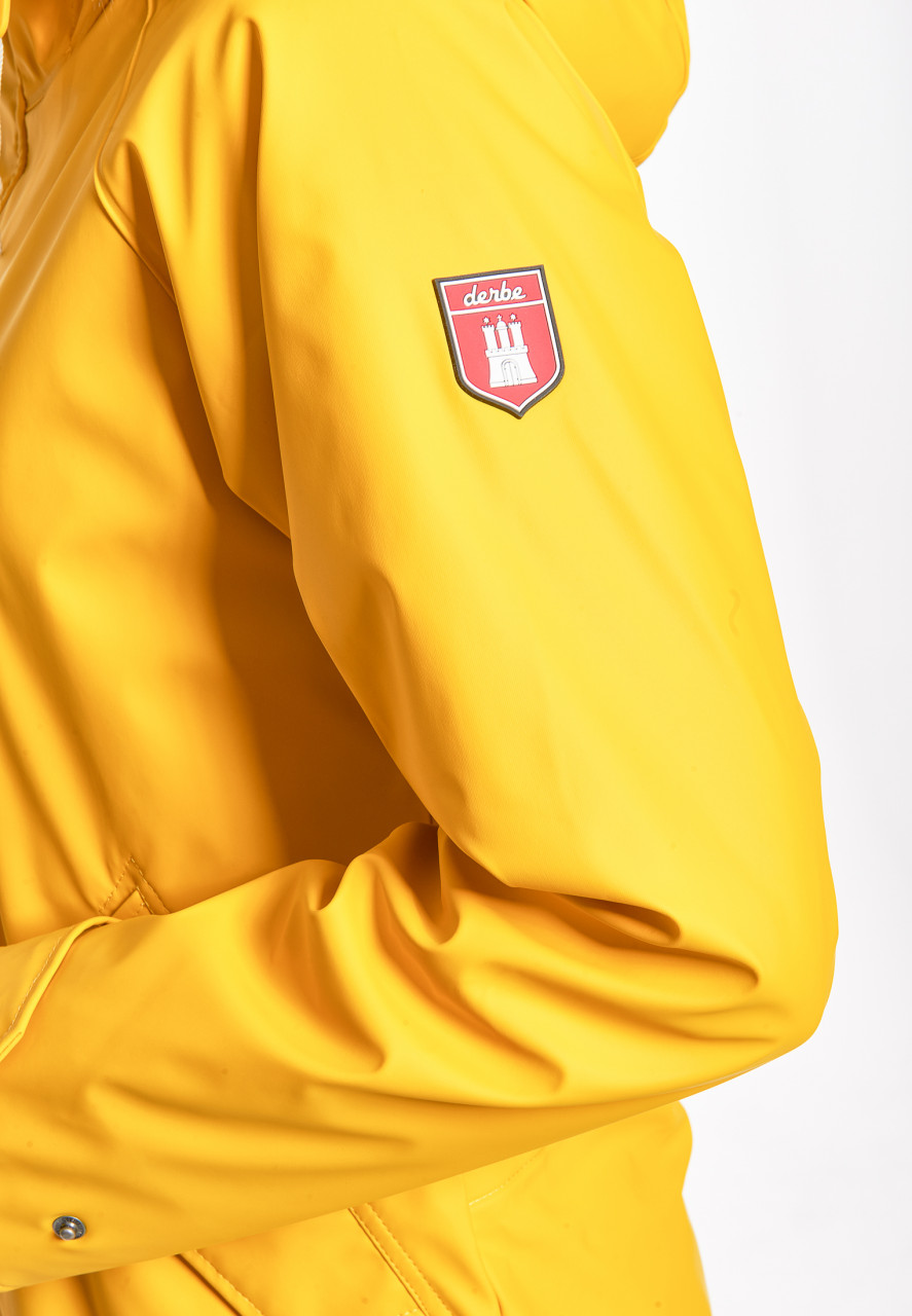 Detailansicht von einer Regenjacke Gelb von derbe