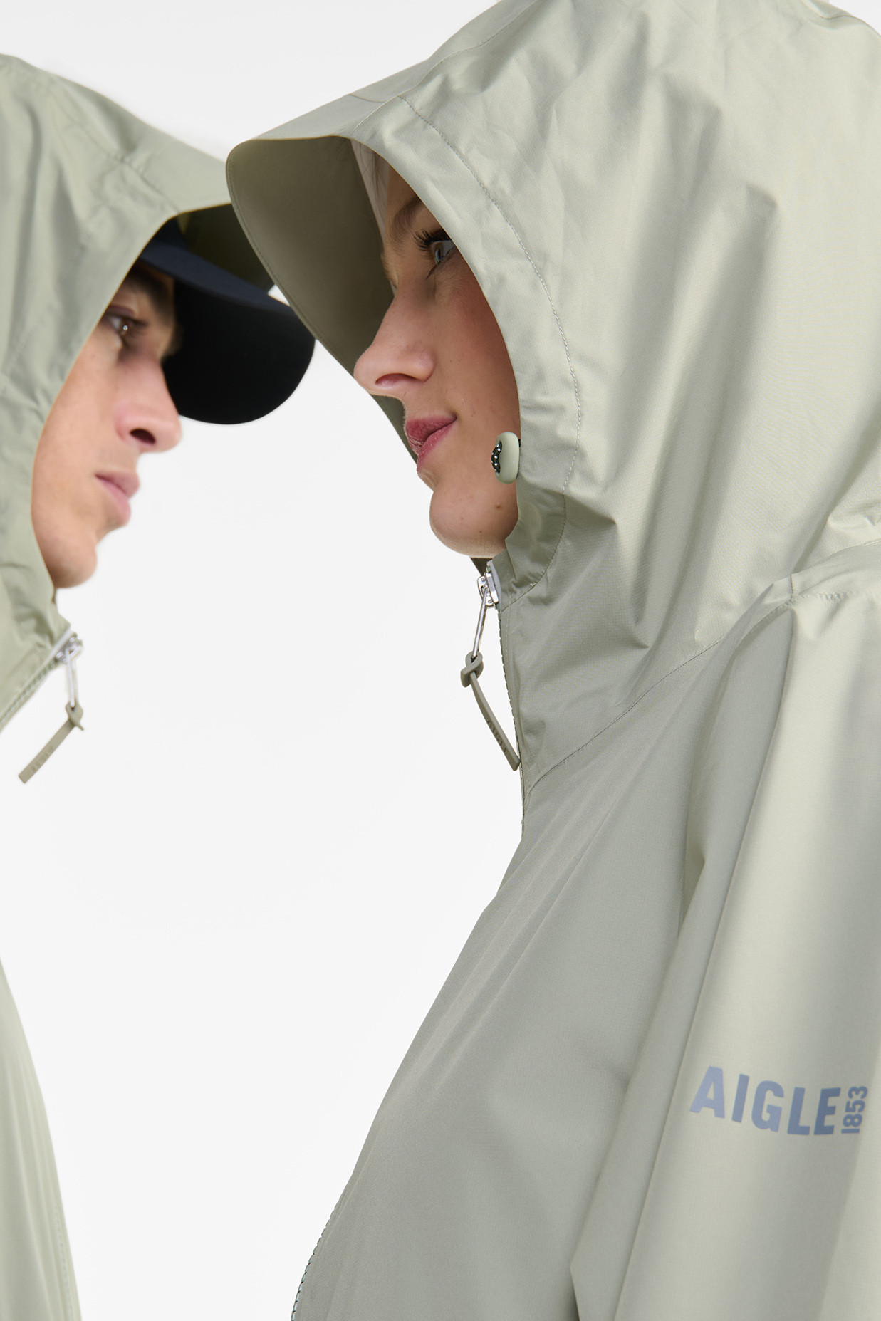 Aigle Regenjacke Hellgrün Grau Langer Parka Packbar Taupe