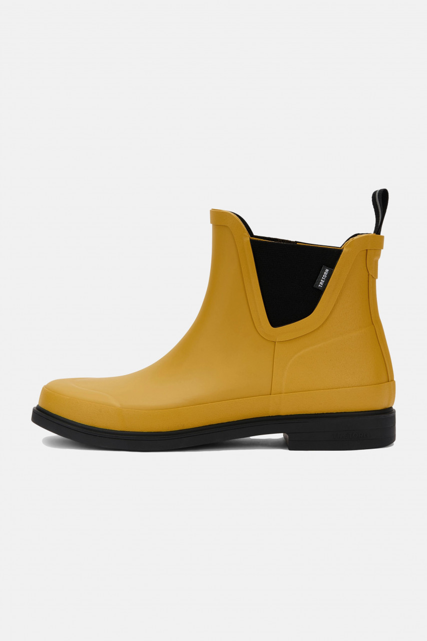 Foto von einem Gummistiefel Gelb der Marke Tretorn - Seitenansicht